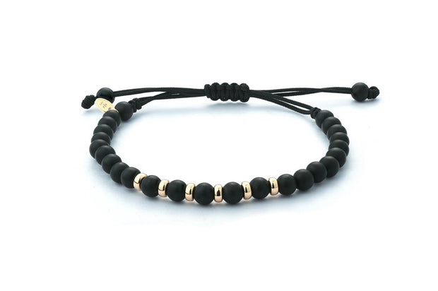Onyx Bracelet with 14k Yellow Gold on black cord (5mm beads)