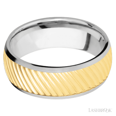 8 mm wide/Domed/14K White Gold band with one 6 mm Centered inlay of 14K Yellow Gold with a machined Ripple pattern.