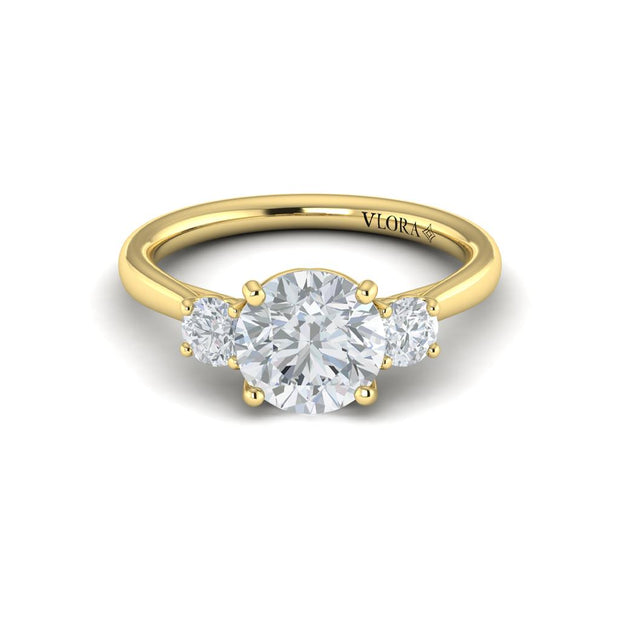 Vlora Bridal Three-Stone Engagement Ring with a Round center stone featuring 0.49 total carats of accent diamonds