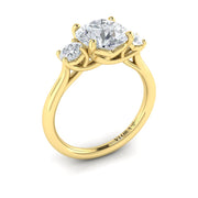 Vlora Bridal Three-Stone Engagement Ring with a Round center stone featuring 0.49 total carats of accent diamonds