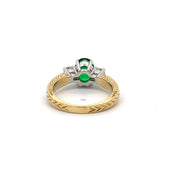 Emerald and Diamond ring in 18k yellow gold with platinum prongs