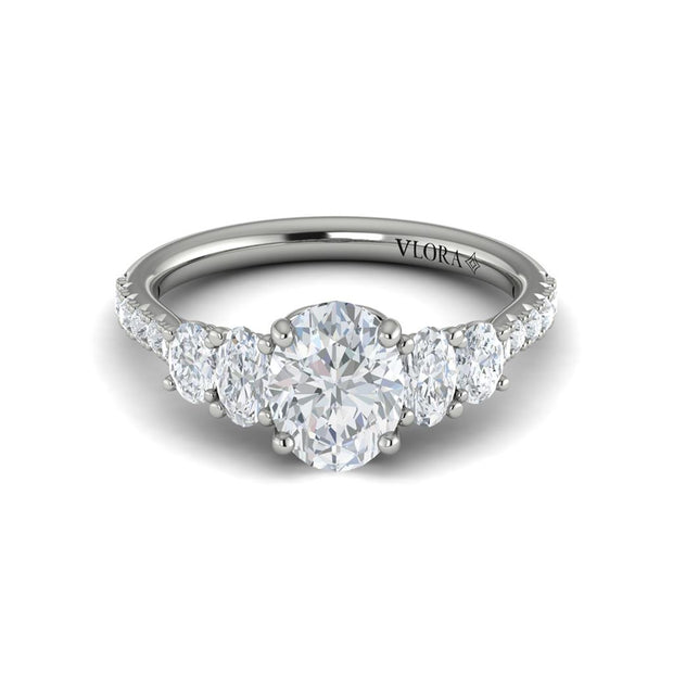 Vlora Bridal Five-Stone Engagement Ring with an Oval center stone featuring .96 total carats of accent Diamonds