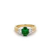Emerald and Diamond ring in 18k yellow gold with platinum prongs