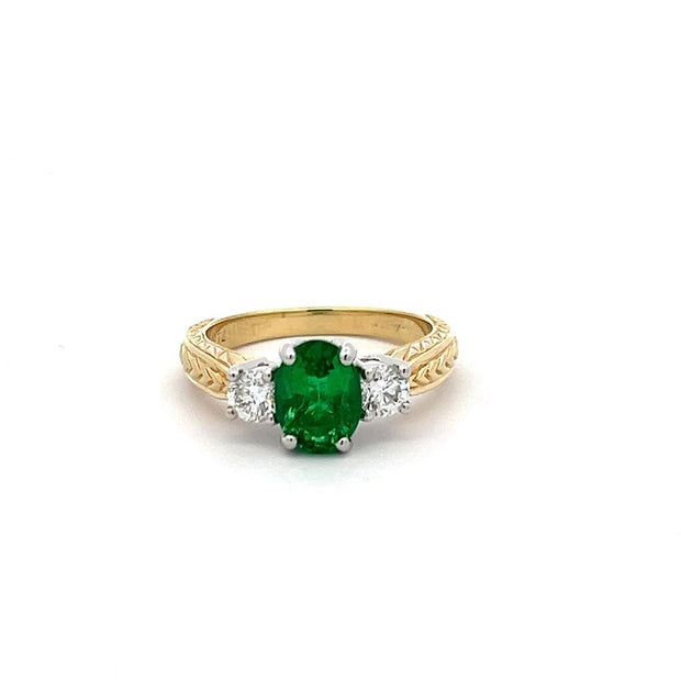 Emerald and Diamond ring in 18k yellow gold with platinum prongs