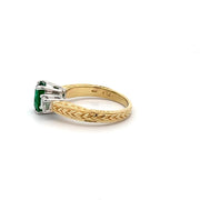 Emerald and Diamond ring in 18k yellow gold with platinum prongs