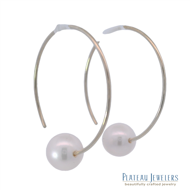Pearl Hoop Earrings in 14k Yellow Gold.