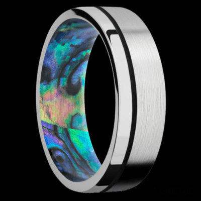 7 mm wide/Flat/14K White Gold band with one 0.5 mm Off Center inlay of Black also featuring a Abalone sleeve.