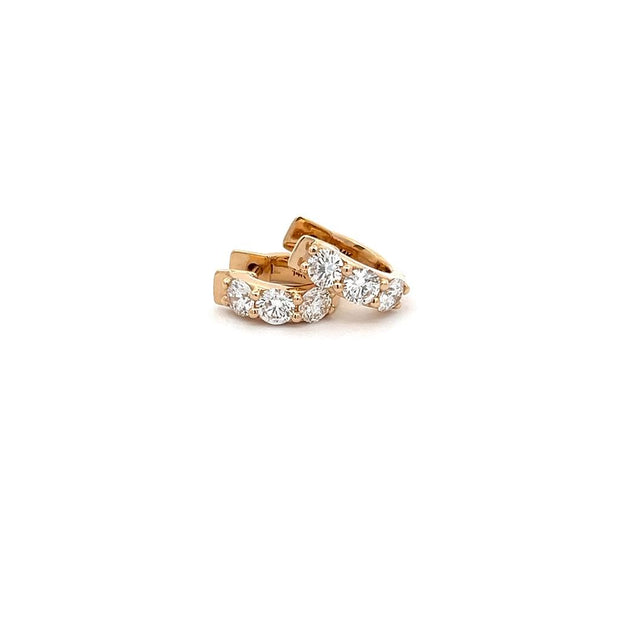 Plateau Jewelers' small diamond hoops in 14k white gold.