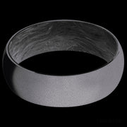 7 mm wide Domed Tantalum band featuring a Forged Carbon Fiber sleeve.