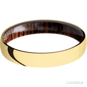 4 mm wide Domed 14K Yellow Gold band featuring a Cocobolo sleeve.