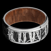 9 mm wide/Flat Grooved Edges/Cobalt Chrome band with a laser carved Aspen pattern also featuring a Leopard Wood sleeve.