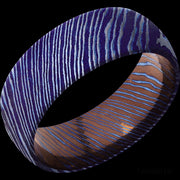 8 mm wide Domed Titanium Damascus band.