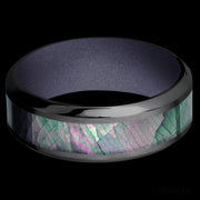 8 mm wide/High Bevel/Zirconium band with one 4 mm Centered inlay of Black Mother of Pearl also featuring a Crushed Orchid sleeve.